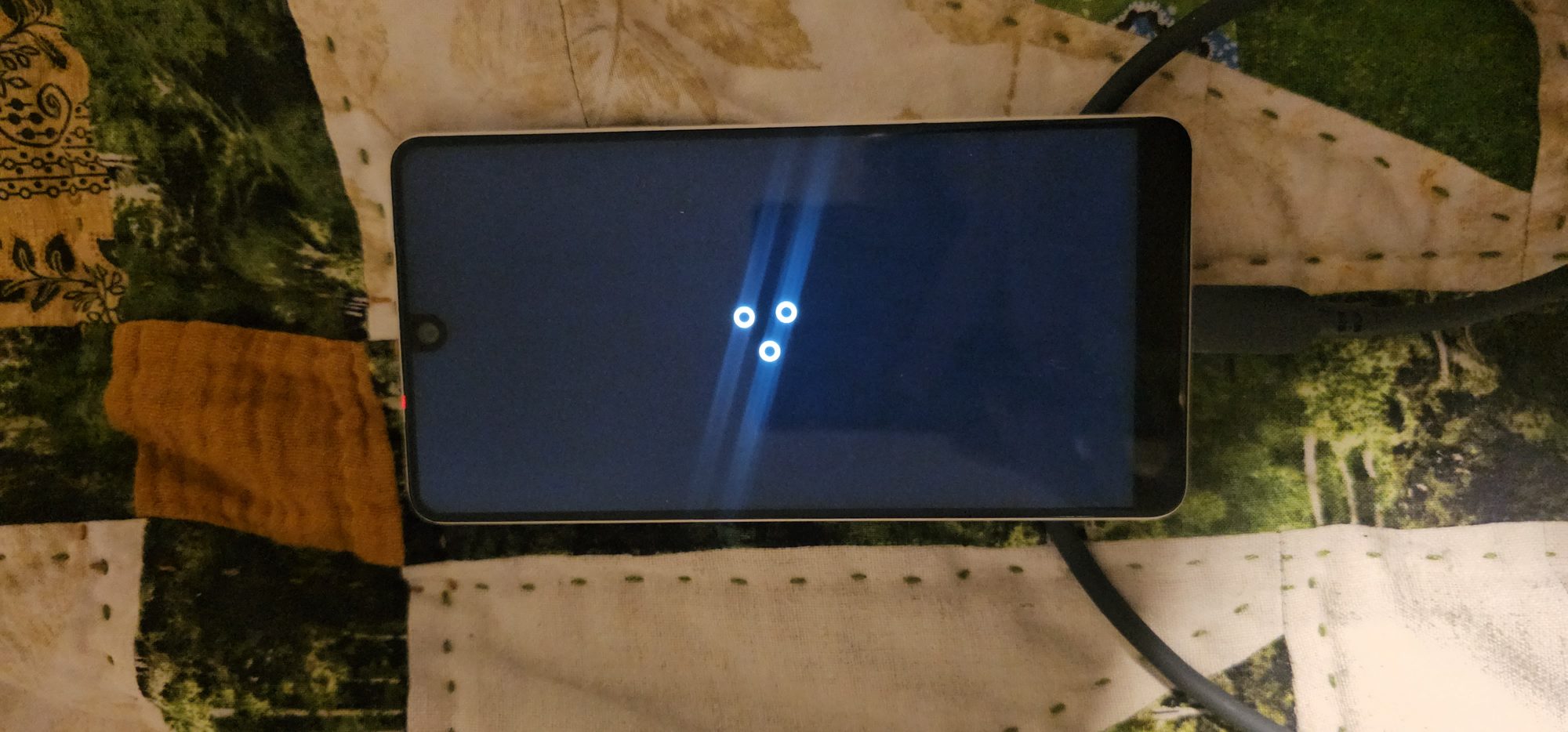 The LineageOS boot animation on the Essential Phone during first boot
