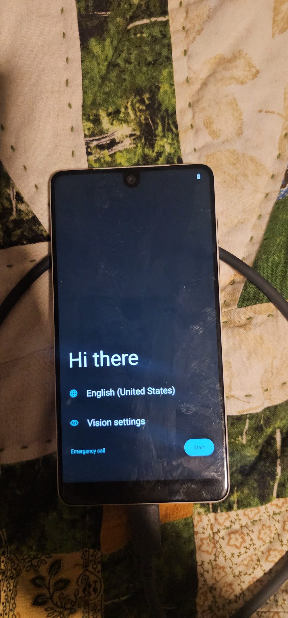The Essential Phone showing the LineageOS setup wizard's "Hi there" welcome screen