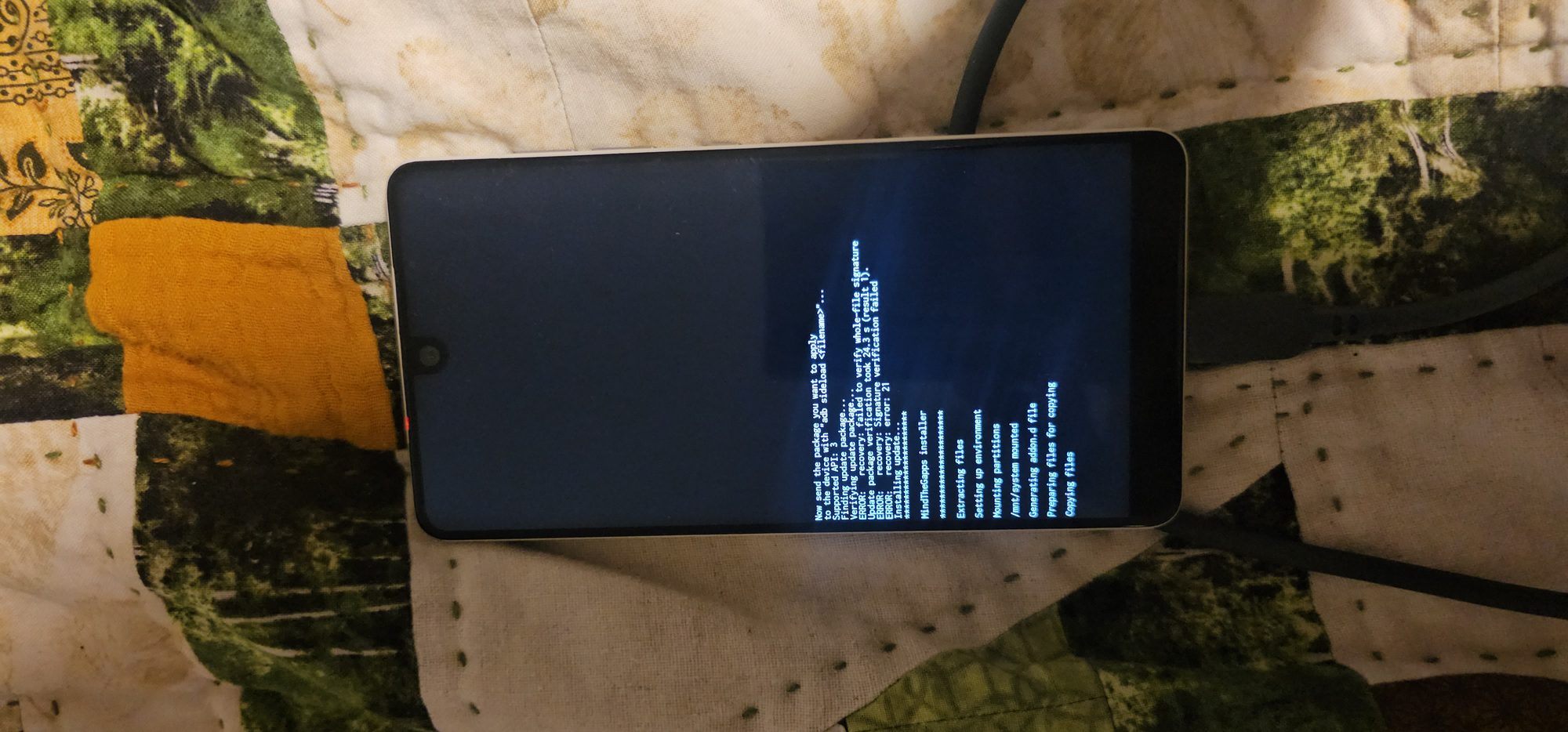 Recovery log on the phone showing the MindTheGapps installer mounting partitions and copying files